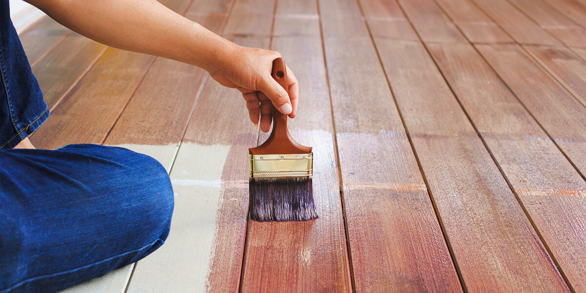 can you paint over stained wood?